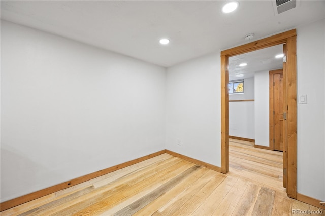 5012 W 36th Ave Unit 5, Denver, CO 80212 - empty room featuring light wood-style flooring, recessed lighting, baseboards, and a smoke detector