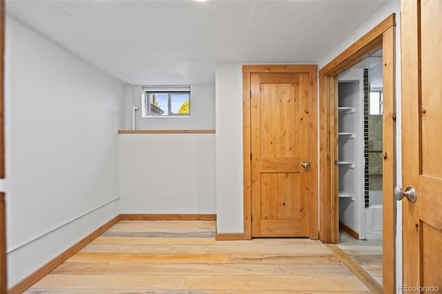 5012 W 36th Ave Unit 5, Denver, CO 80212 - corridor with hardwood / wood-style flooring and baseboards