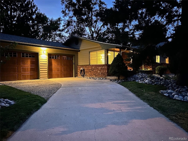 view of front of property with a garage