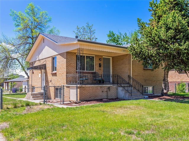 2695 S Logan St, Denver, CO 80210 - view of front facade featuring brick siding and covered porch