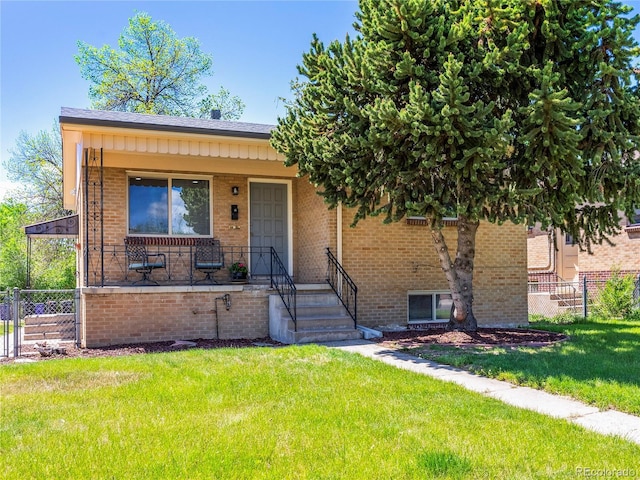 2695 S Logan St, Denver, CO 80210 - view of front of home with brick siding and a porch