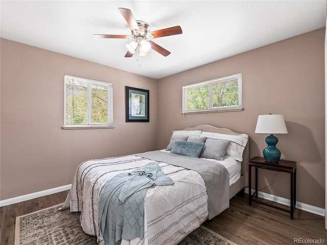 2695 S Logan St, Denver, CO 80210 - bedroom featuring baseboards, wood finished floors, and a ceiling fan