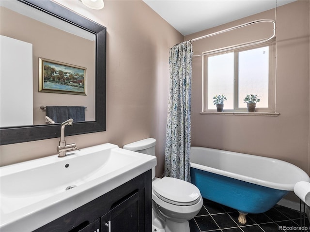 2695 S Logan St, Denver, CO 80210 - full bathroom with a freestanding tub, toilet, vanity, tile patterned floors, and curtained shower