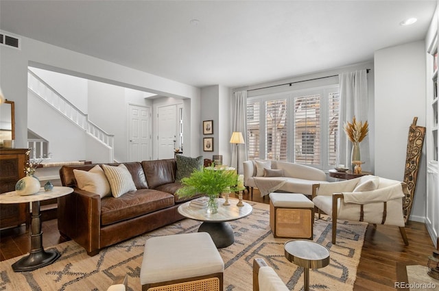 living room featuring dark hardwood / wood-style floors