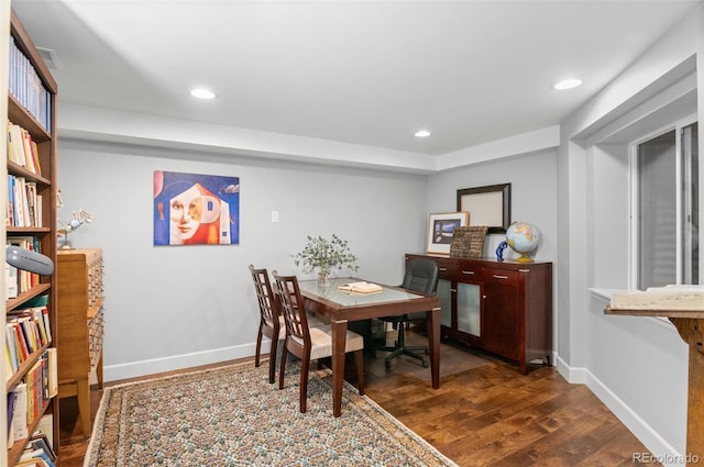 dining room with wood-type flooring