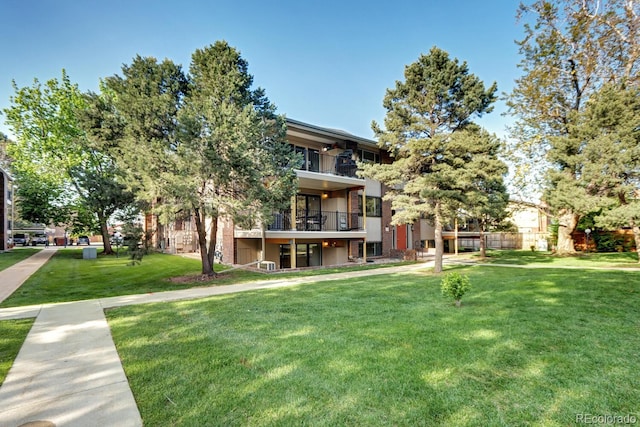 600 Manhattan Dr Unit 4C, Boulder, CO 80303 - view of home's community featuring a yard
