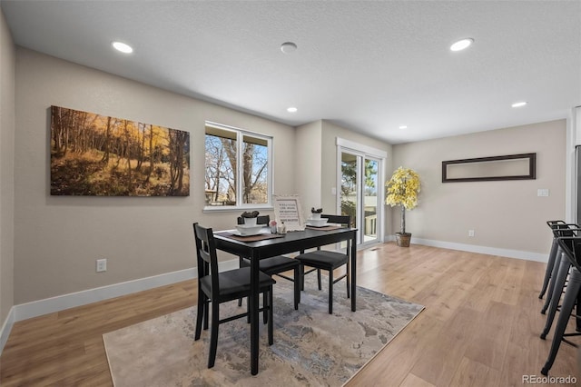 8334 Allison Ct, Arvada, CO 80005 - dining room with light wood-style flooring, baseboards, and recessed lighting