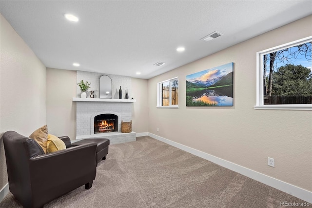 8334 Allison Ct, Arvada, CO 80005 - living room featuring carpet floors, a fireplace, recessed lighting, and baseboards
