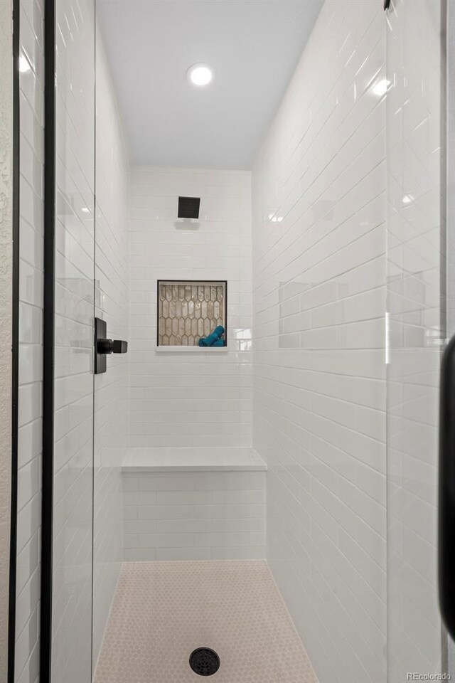 8334 Allison Ct, Arvada, CO 80005 - bathroom featuring tiled shower and recessed lighting