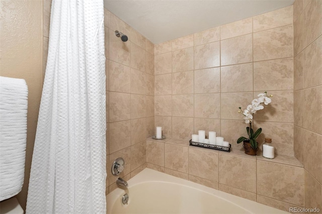 bathroom featuring shower / bath combination with curtain