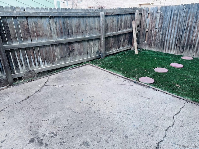 view of yard featuring a fenced backyard