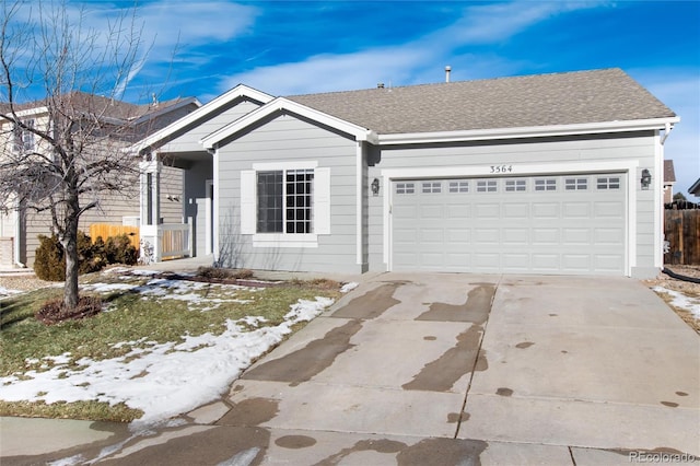 ranch-style home with a garage