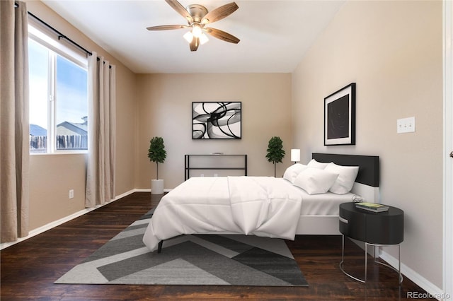 bedroom featuring dark wood-type flooring and ceiling fan