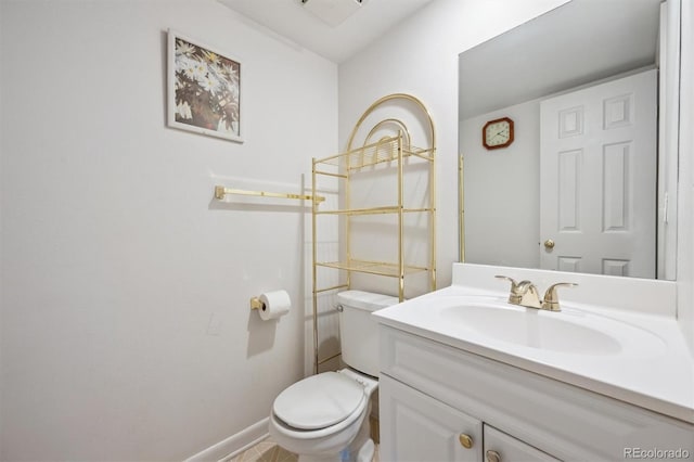 1254 S Yosemite Way Unit 99, Denver, CO 80247 - half bath with toilet, vanity, and baseboards