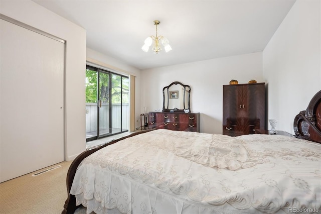 1254 S Yosemite Way Unit 99, Denver, CO 80247 - bedroom with access to exterior, a chandelier, and carpet
