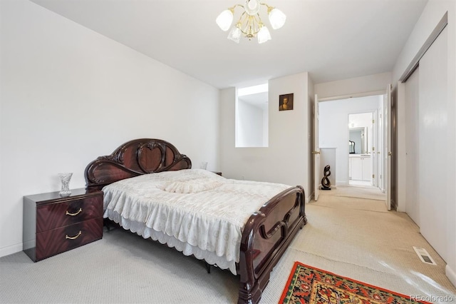 1254 S Yosemite Way Unit 99, Denver, CO 80247 - bedroom featuring light colored carpet, a chandelier, a closet, and baseboards
