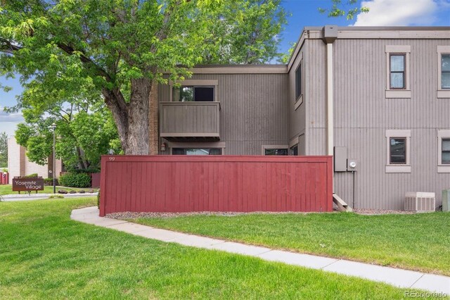 1254 S Yosemite Way Unit 99, Denver, CO 80247 - view of property exterior featuring central AC unit