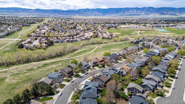 aerial view with a residential view and a mountain view