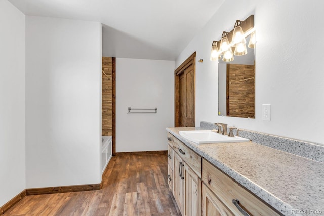 573 Beasley Blvd, Cotopaxi, CO 81223 - bathroom featuring vanity, wood finished floors, a bathtub, a chandelier, and a shower