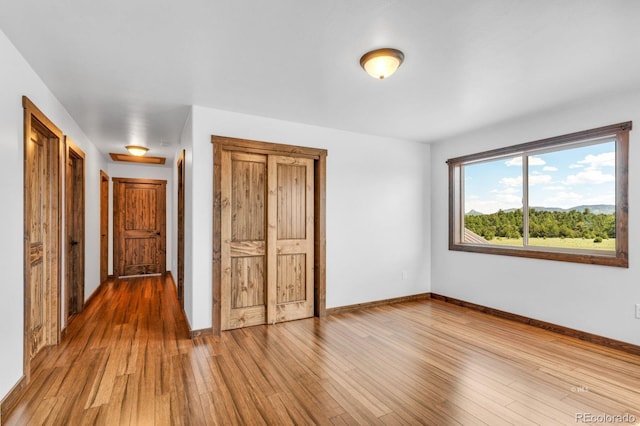 573 Beasley Blvd, Cotopaxi, CO 81223 - unfurnished bedroom featuring wood finished floors