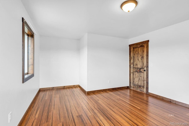 573 Beasley Blvd, Cotopaxi, CO 81223 - empty room with wood finished floors and baseboards