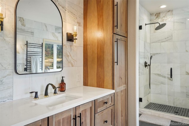 bathroom featuring vanity and walk in shower