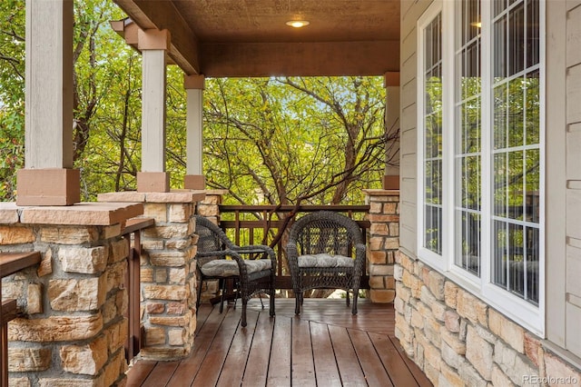 wooden deck featuring a porch