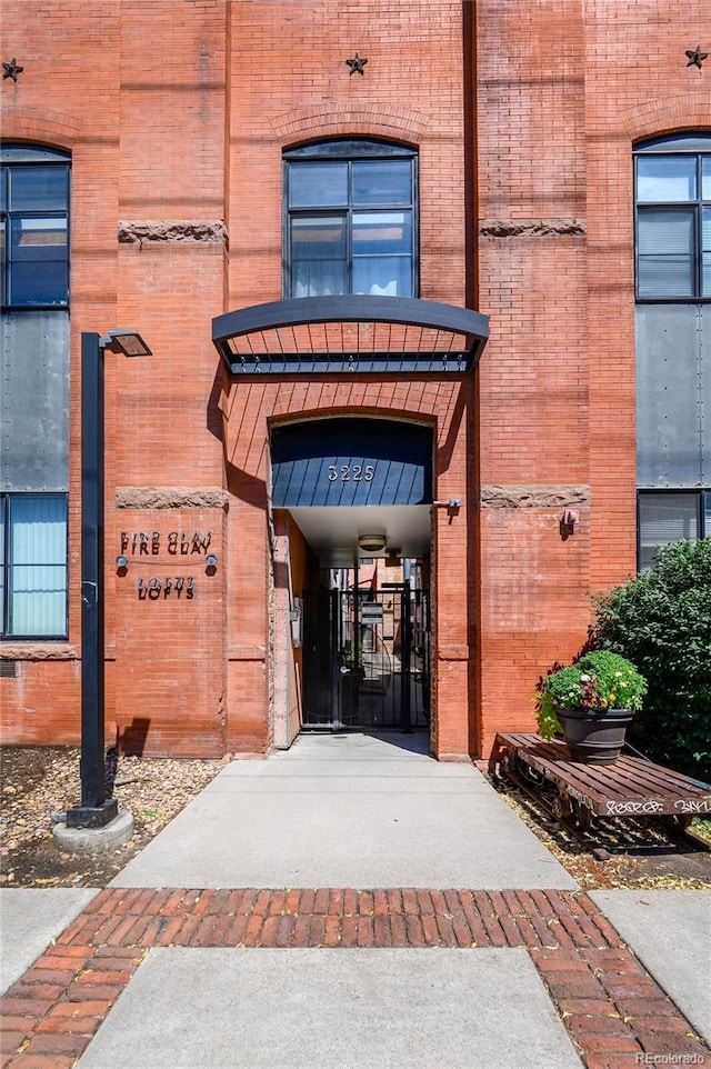3225 Blake St Unit 4, Denver, CO 80205 - view of exterior entry featuring brick siding