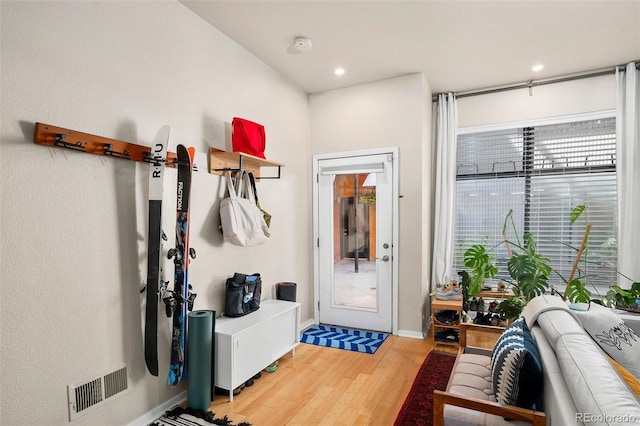 3225 Blake St Unit 4, Denver, CO 80205 - mudroom featuring wood finished floors and recessed lighting