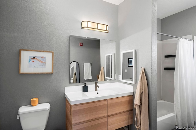 3225 Blake St Unit 4, Denver, CO 80205 - bathroom featuring vanity, shower / tub combo, and a textured wall