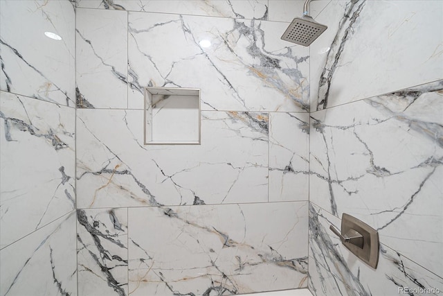 1827 Quail St Unit 3, Lakewood, CO 80215 - bathroom featuring tiled shower