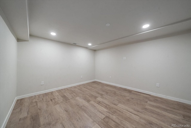 1827 Quail St Unit 3, Lakewood, CO 80215 - empty room with light wood-style floors, recessed lighting, and baseboards