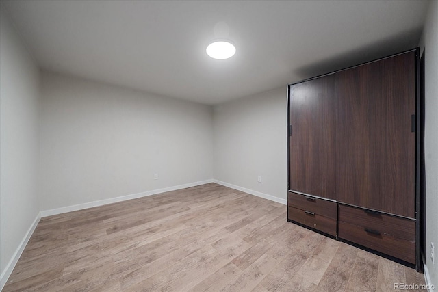 unfurnished bedroom with light hardwood / wood-style flooring