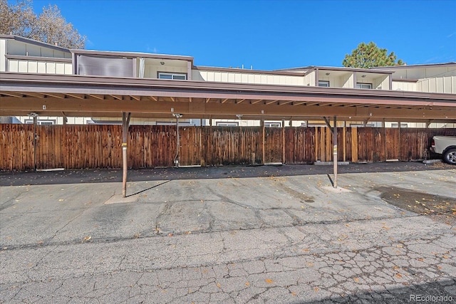 view of parking with a carport