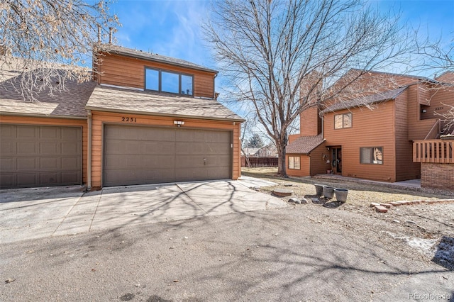 view of property exterior featuring a garage