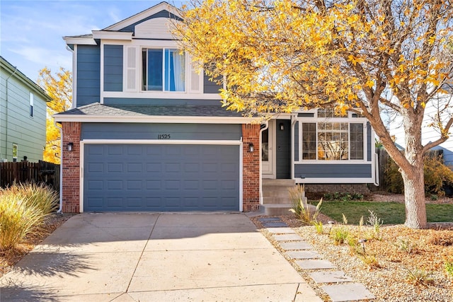 11525 Eaton Ct, Westminster, CO 80020 - view of front of home featuring fence, brick siding, a shingled roof, an attached garage, and driveway