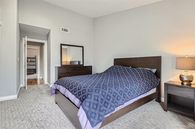 1818 S Quebec Way Unit 11-8, Denver, CO 80231 - bedroom featuring carpet floors, baseboards, and visible vents