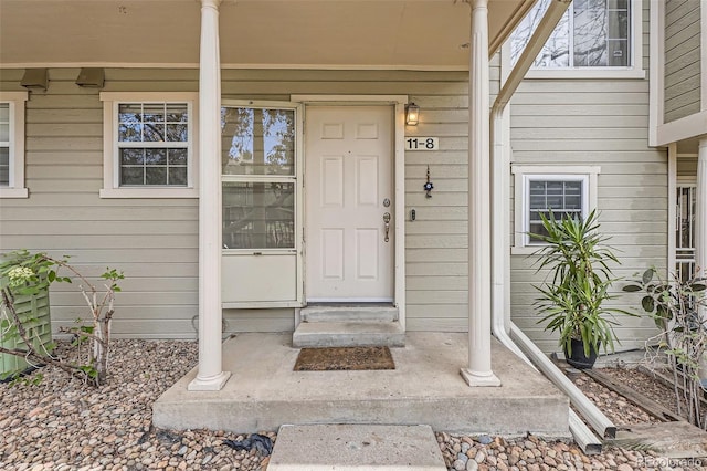 1818 S Quebec Way Unit 11-8, Denver, CO 80231 - property entrance featuring covered porch