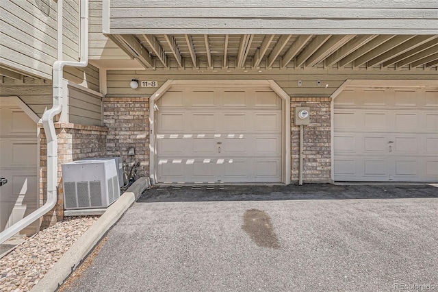 1818 S Quebec Way Unit 11-8, Denver, CO 80231 - view of garage
