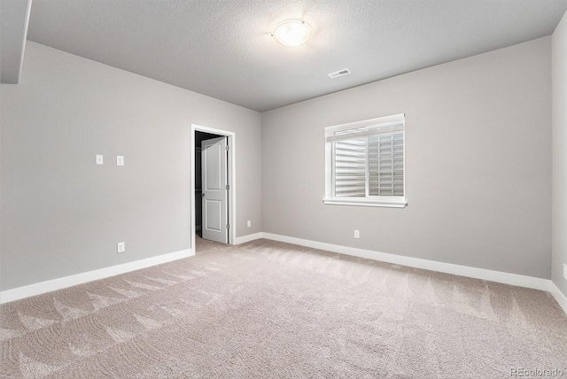 7293 Xenophon Ct, Arvada, CO 80004 - unfurnished room featuring light carpet and a textured ceiling