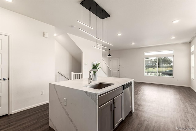 3805 N Himalaya Rd Unit 1, Denver, CO 80249 - kitchen with dark wood-style flooring, an island with sink, recessed lighting, dishwasher, and hanging light fixtures
