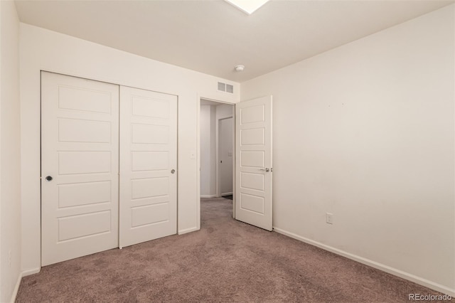 3805 N Himalaya Rd Unit 1, Denver, CO 80249 - unfurnished bedroom with carpet floors and a closet