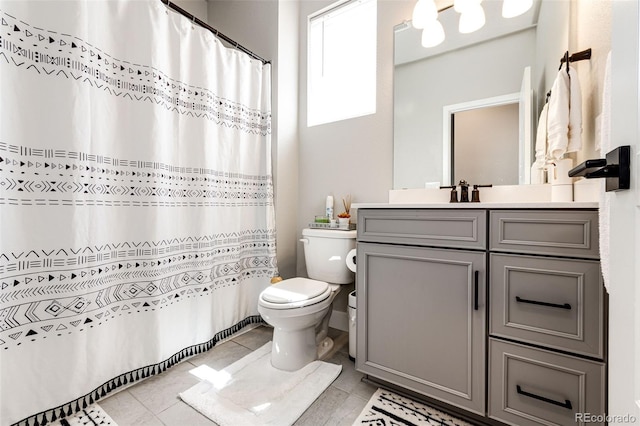 3722 Sandy Vista Trl, Castle Rock, CO 80104 - full bathroom featuring toilet, tile patterned floors, vanity, and curtained shower