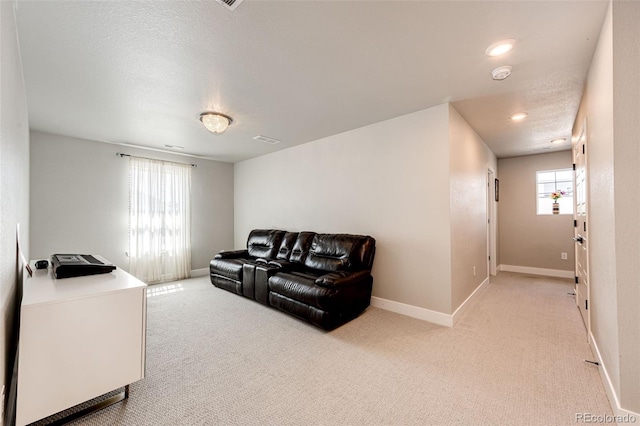 3722 Sandy Vista Trl, Castle Rock, CO 80104 - living area with light carpet, baseboards, and recessed lighting