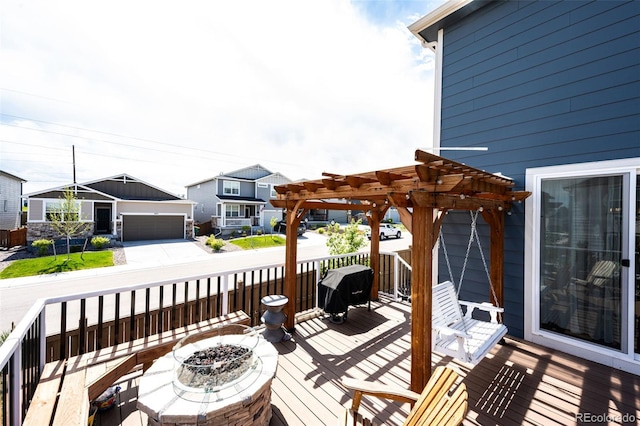 3722 Sandy Vista Trl, Castle Rock, CO 80104 - wooden deck with a pergola, an outdoor fire pit, and a grill