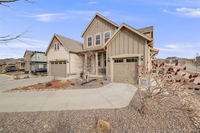 view of front of house with a garage, concrete driveway, and board and batten siding