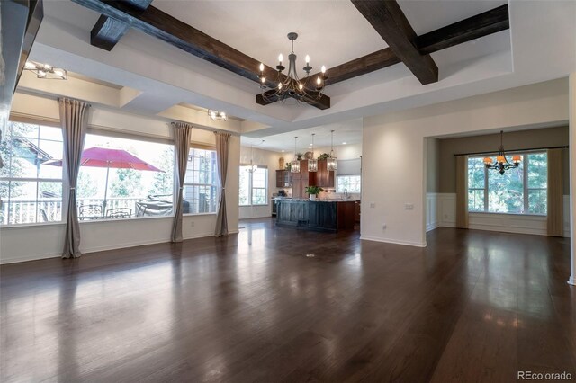 24733 E Park Crescent Dr, Aurora, CO 80016 - living area featuring a chandelier, dark wood finished floors, coffered ceiling, beamed ceiling, and plenty of natural light