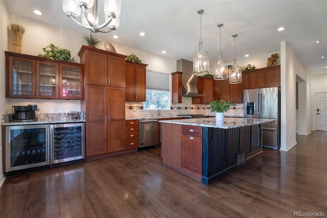 24733 E Park Crescent Dr, Aurora, CO 80016 - kitchen featuring appliances with stainless steel finishes, a chandelier, wall chimney exhaust hood, beverage cooler, and dark wood finished floors