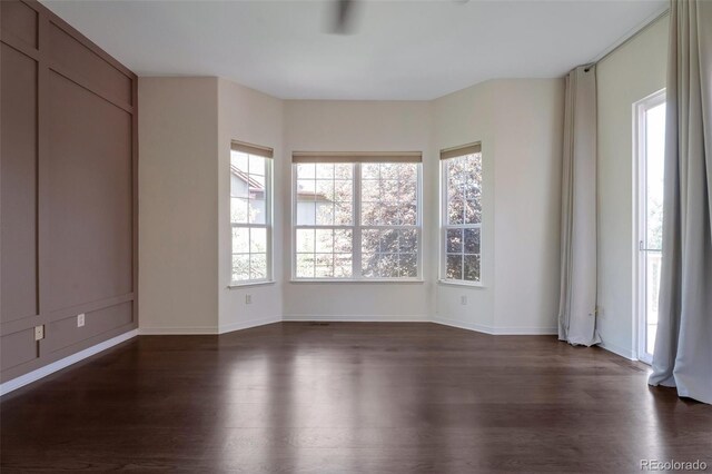 24733 E Park Crescent Dr, Aurora, CO 80016 - unfurnished room featuring dark wood-type flooring