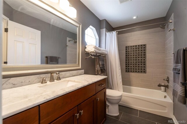 24733 E Park Crescent Dr, Aurora, CO 80016 - full bathroom with tile patterned flooring, shower / bath combination with curtain, and vanity